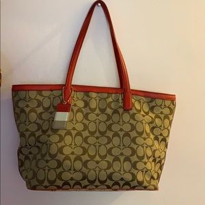Brown and red Coach Tote